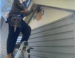 Affordable siding repair and maintenance services in Sturgeon Bay, WI